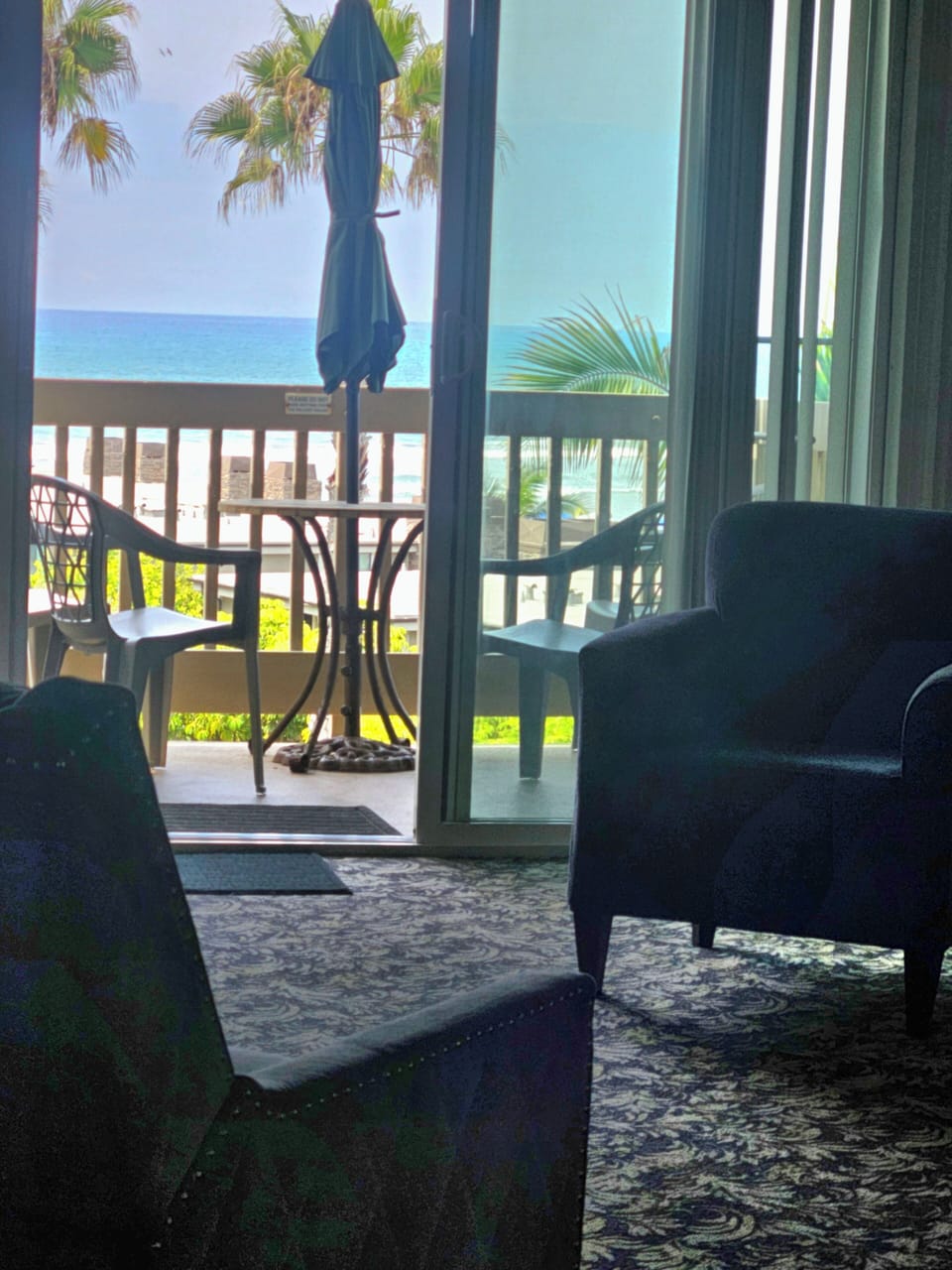 The living area lives well with its adjacent ocean facing balcony. There are some north facing condos with north facing windows to the left side of this west facing  condo photo.