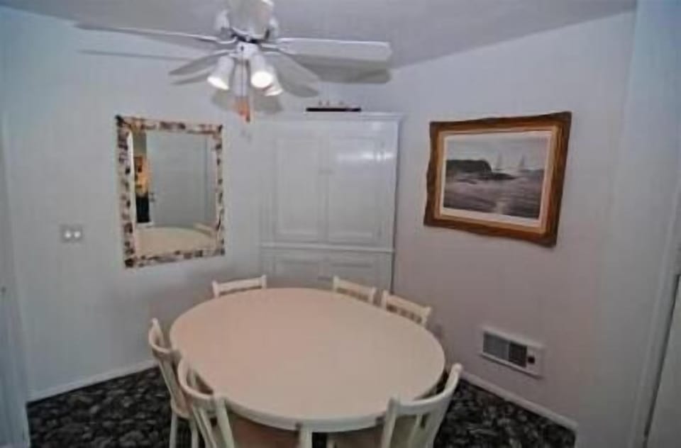 Dining. Kitchen to left.