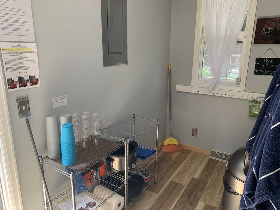 Main level mud room with hot tub essentials and also stuff for your pup!