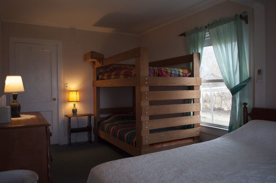 First floor "bunk room" with double plus two twin beds and ocean view