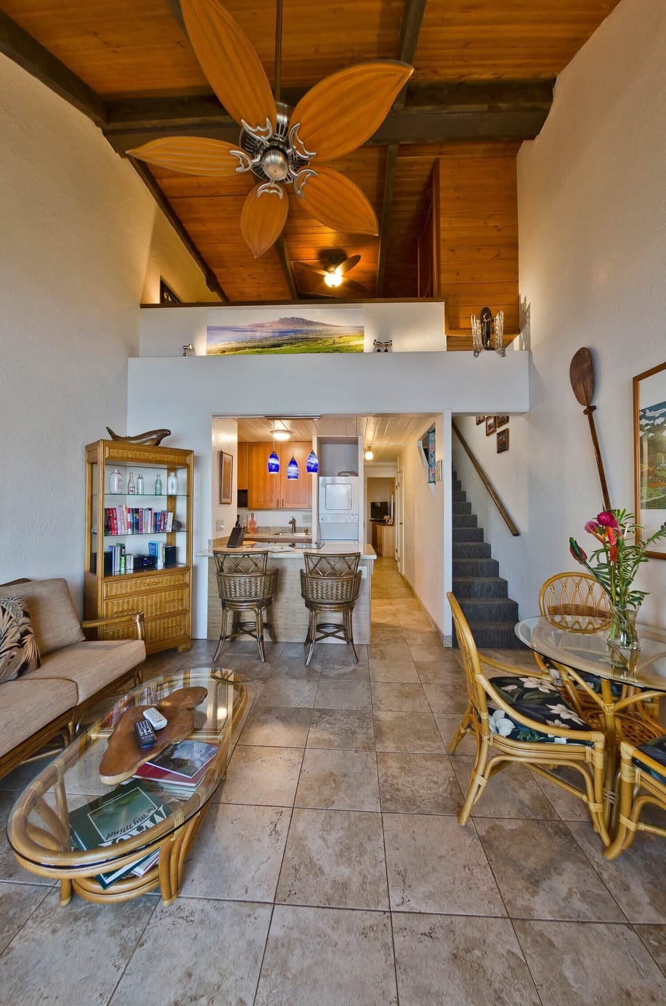 View From Lanai showing second floor loft area, w/ hall and stairs to bedrooms