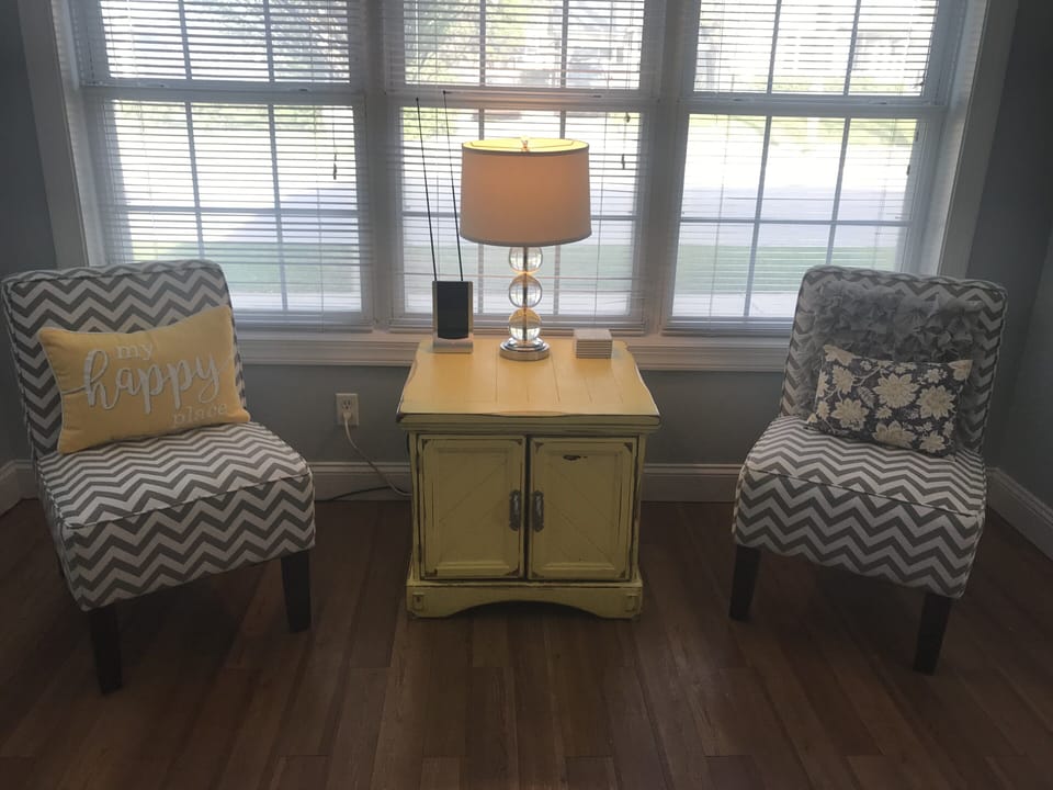 Enjoy reading in our cozy nook in the living room