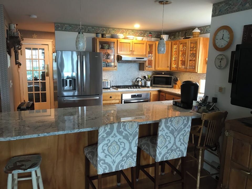 Kitchen and counter seating.