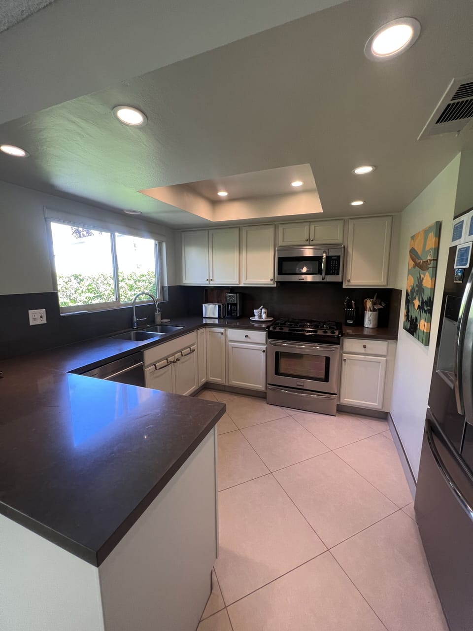 The kitchen has Frigidaire Gallery appliance, including a gas stove.