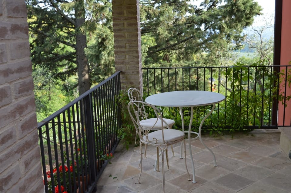 patio outside one of the bedrooms with views over the countryside