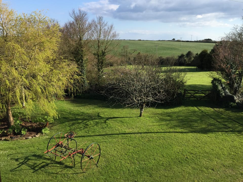 View of garden and fields from double bedroom.