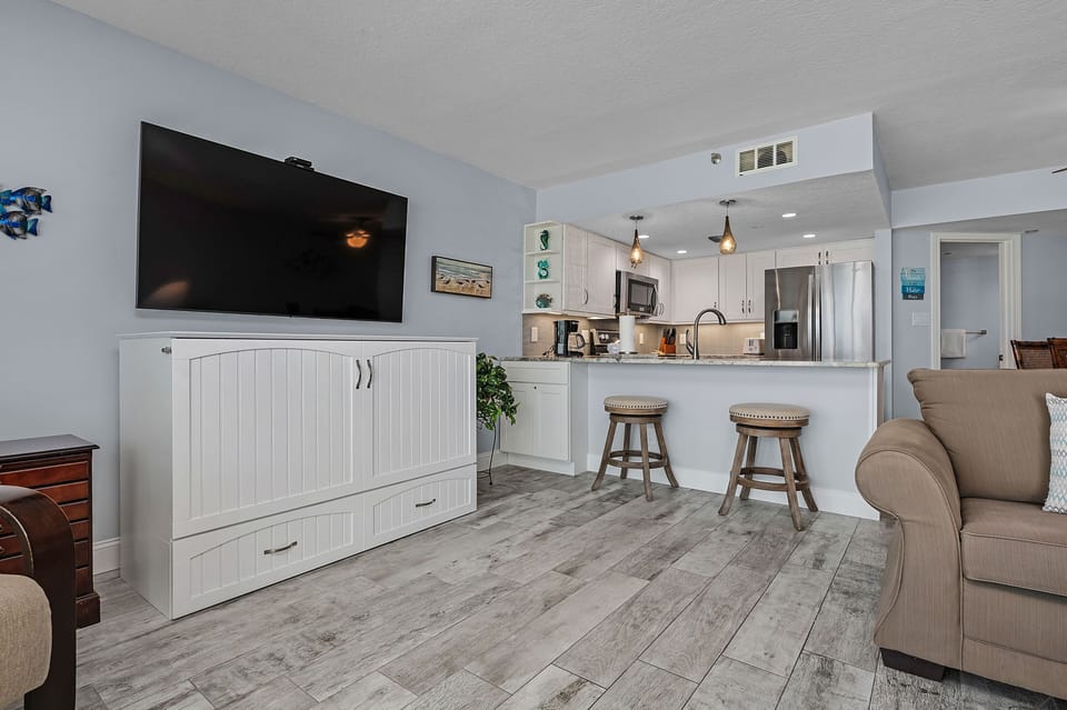Living Area with Hidden Dresser Bed