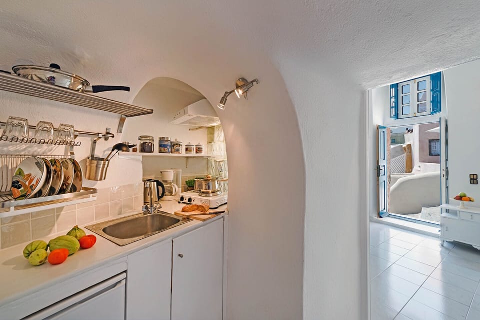 Cozy HELIOS' kitchenette for romantic island living, perfect for coffee & snacks