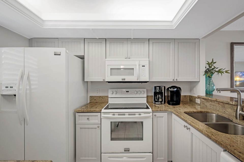 The fully updated kitchen has everything you need to whip up your favorite meals while on vacation