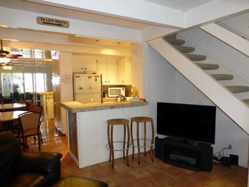 Kitchen and stairs to Bedroom and Loft