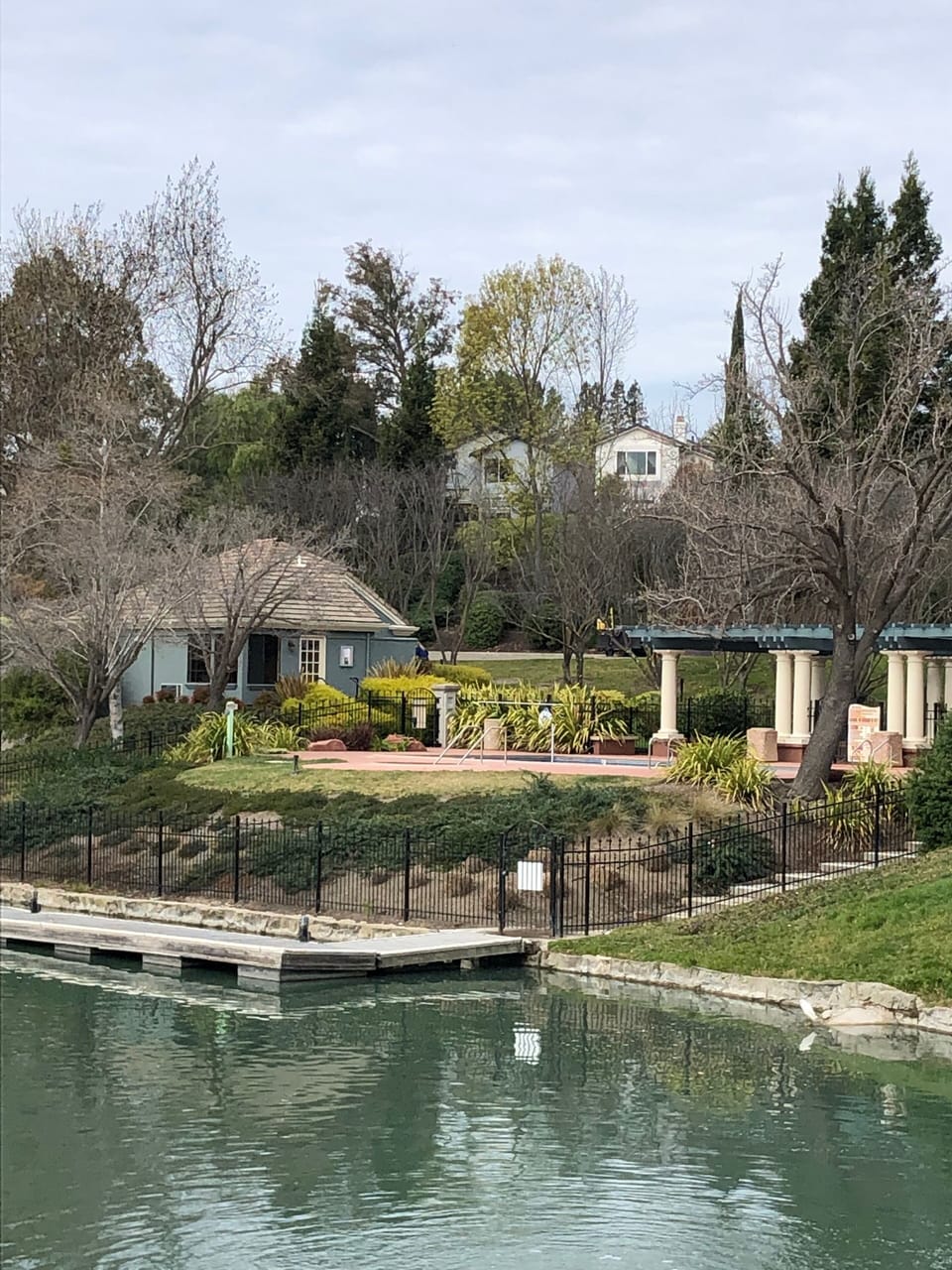 One of 4 swimming pools, hot tub overlooks lake and fountains
