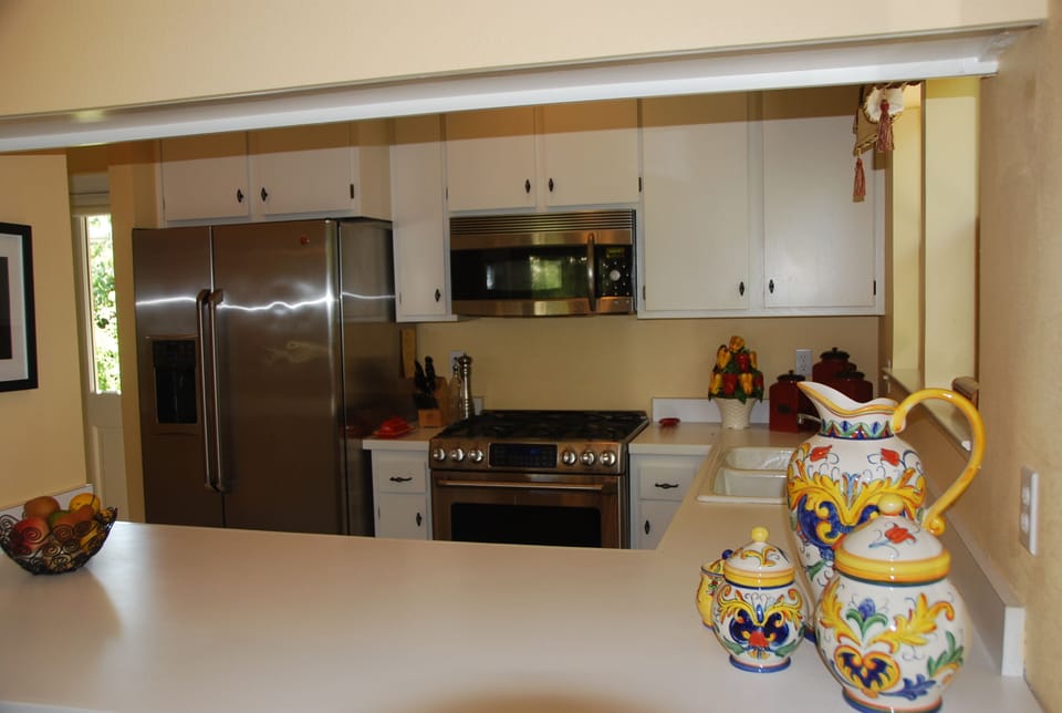 Counter barstools for visiting with the family chef.