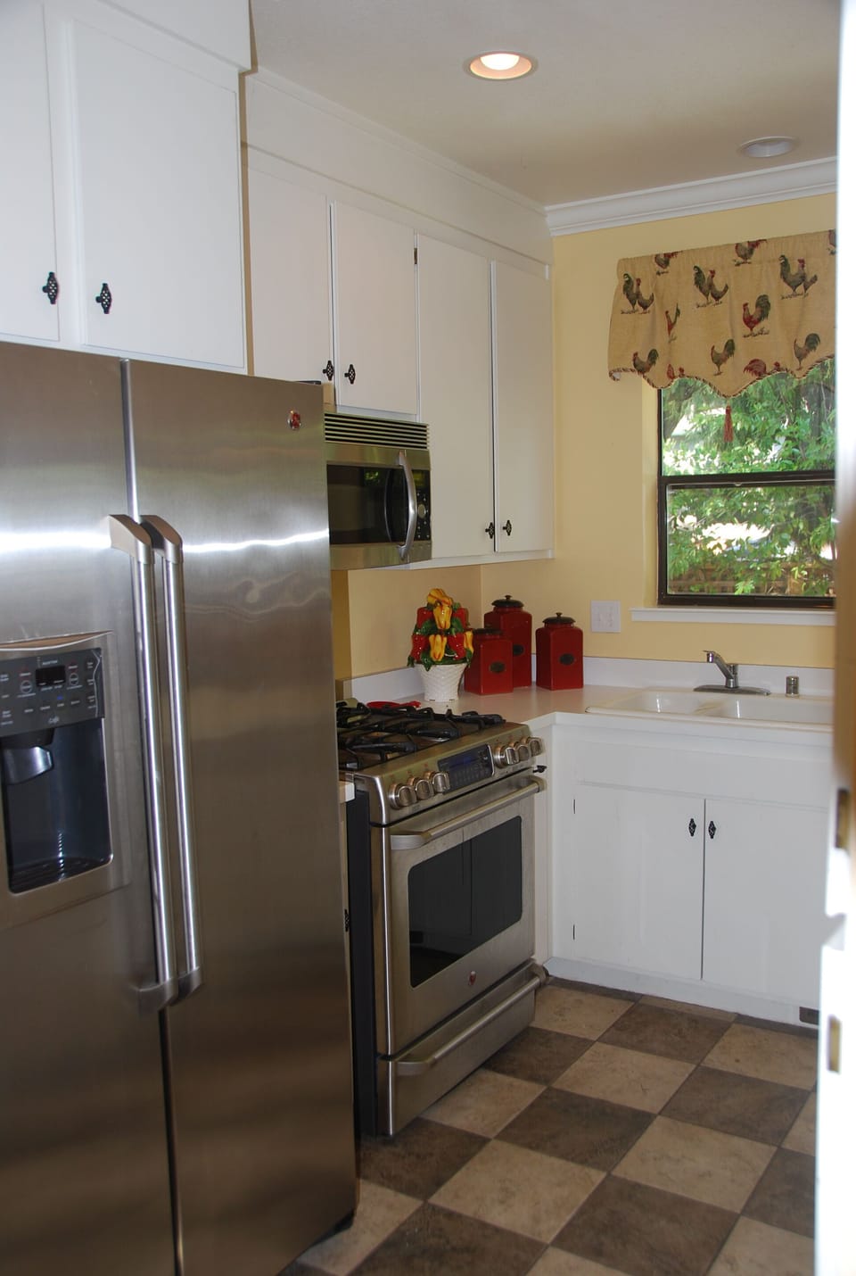 A collection of kitchen utensils await the gourmet cook.