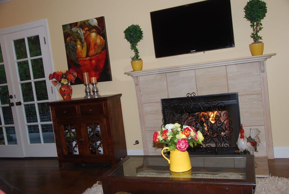 Read a cookbook or travel guide from the bookshelves while in front of the fire.