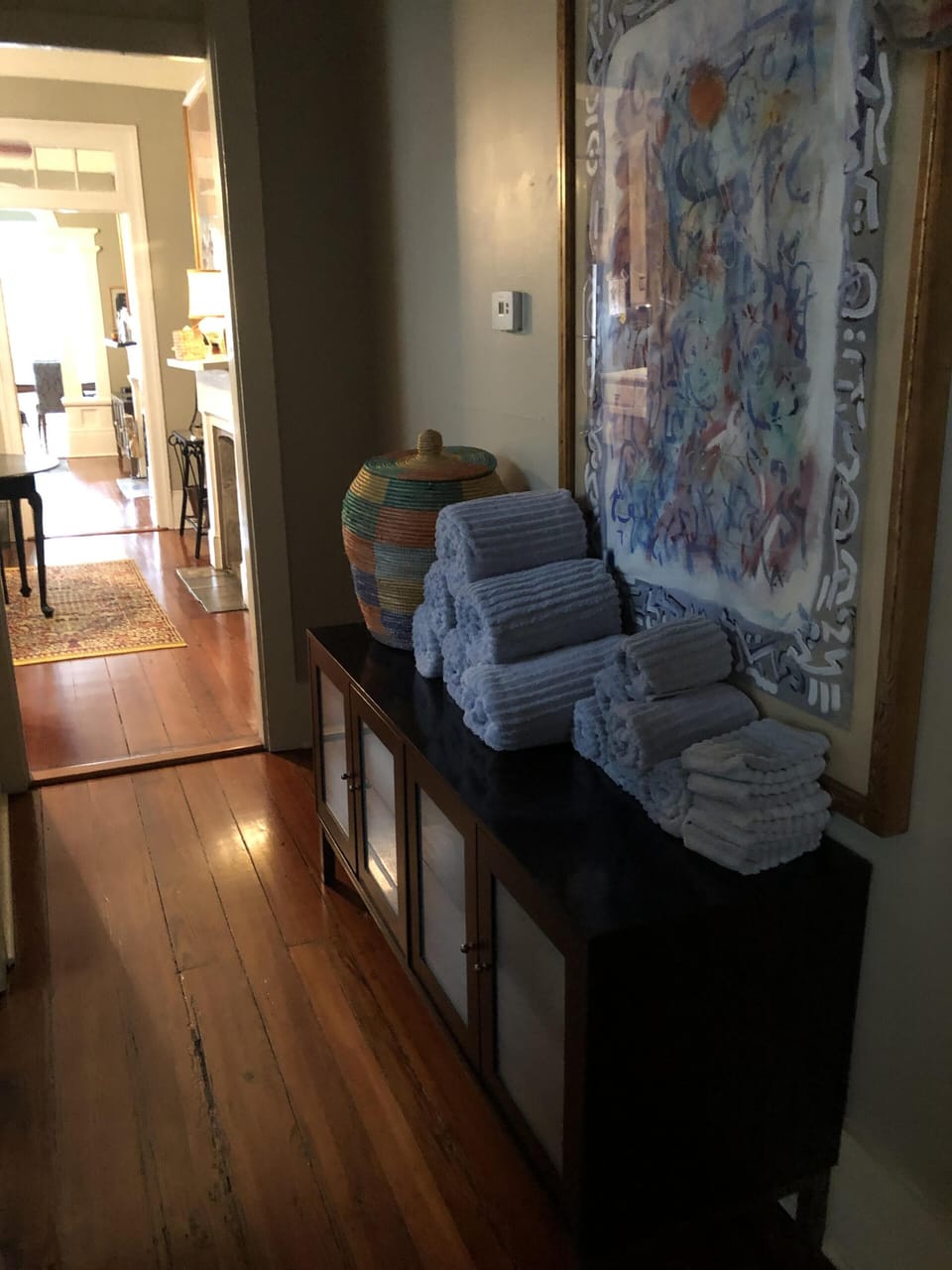 Plenty of fresh, fluffy towels right outside the bathroom door