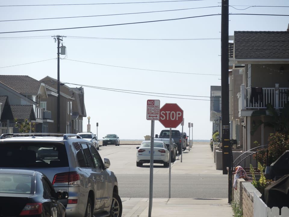 Taken from our front sidewalk - the beach starts where the street ends. 