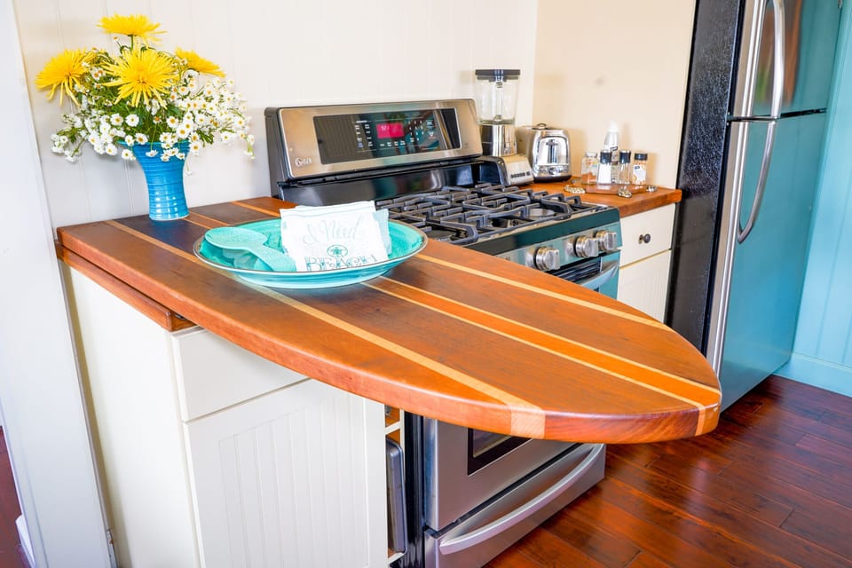 Surf table designed by Kimberlee and made by local craftsman. It folds away. 