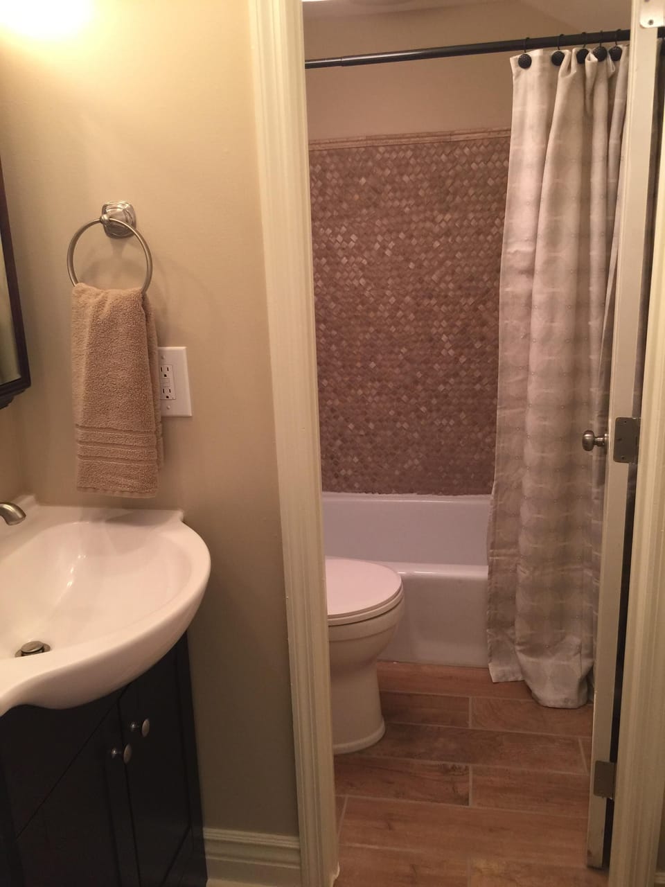 Master Loft Bath with Travertine Woven Tiling in Shower