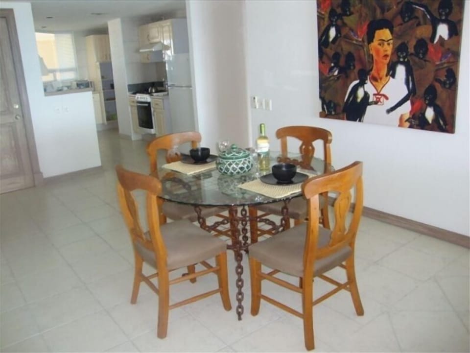 Dining Area with kitchen in background