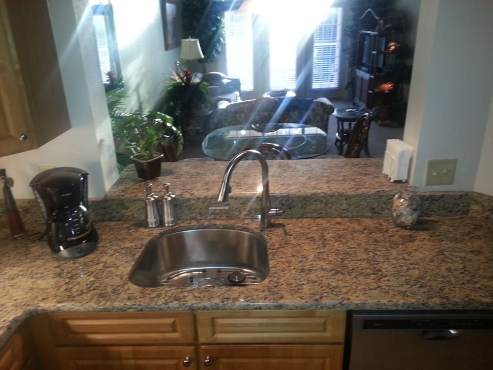 New kitchen with Brazilian Granite countertops, and porcelain floors