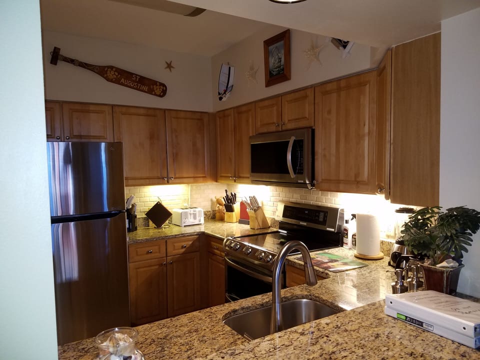 Stainless Appliances, New sink and Granite Tops