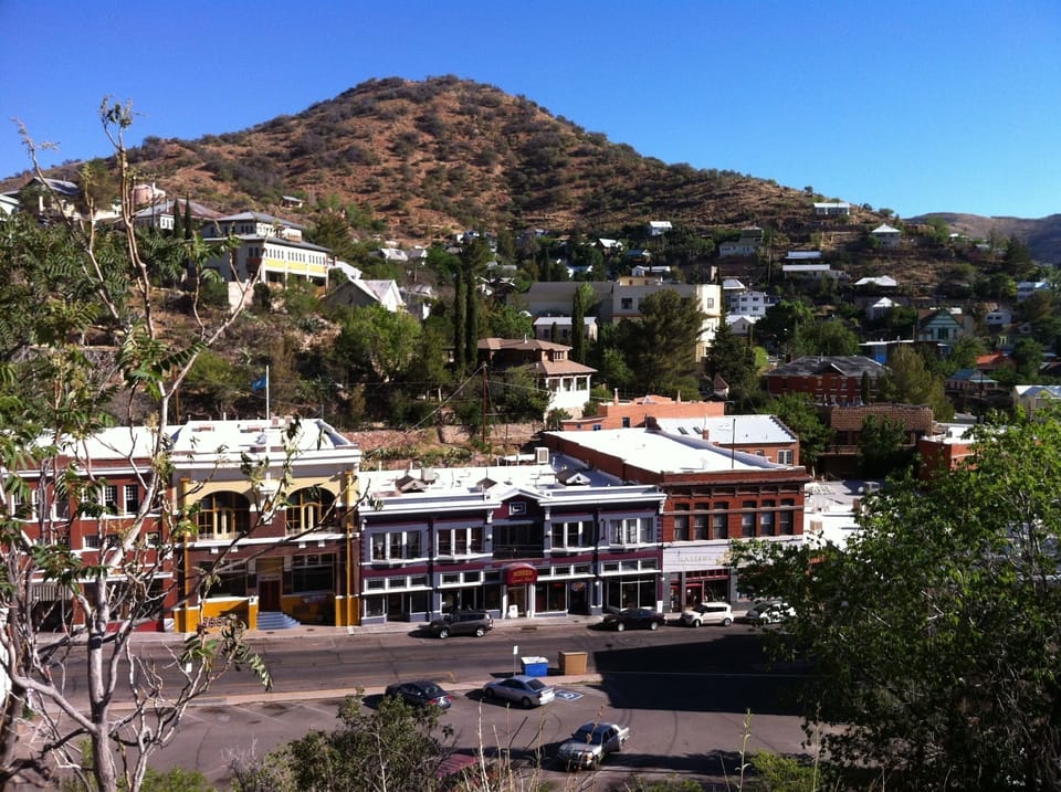 Bisbee, AZ, only 90 miles and features an eclectic array of artisans and shops. 