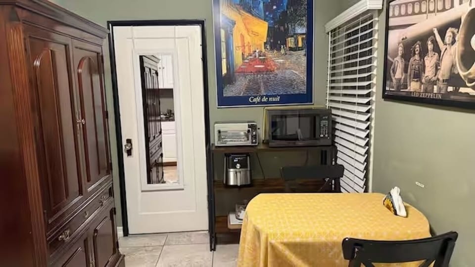 Dining area with air fryer, microwave, toaster oven, hot plates...