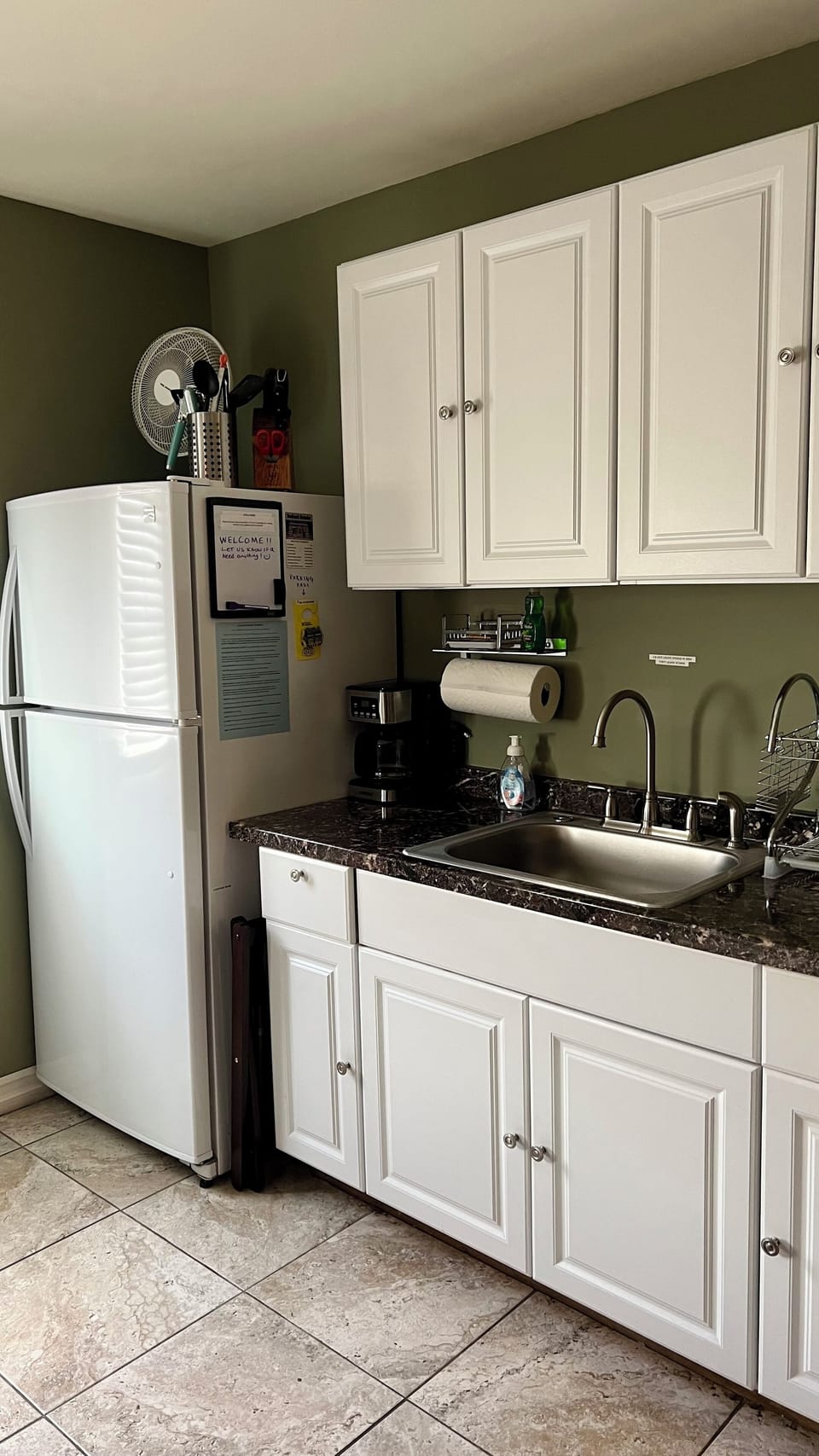 Fully stocked kitchenette (no stove) with full-size refrigerator & coffee maker