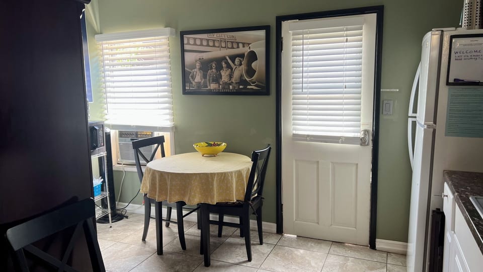 Kitchen dining table and kitchenette area. 
