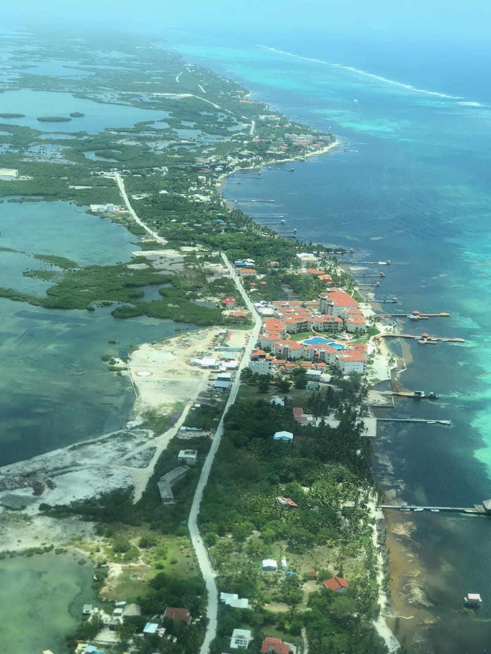 Arial view of Grand Caribe - all the red roofs in the center of the picture.