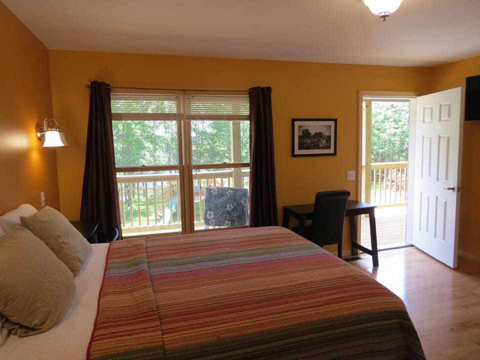 One of the bedrooms in the 10 bedroom house showing the private deck