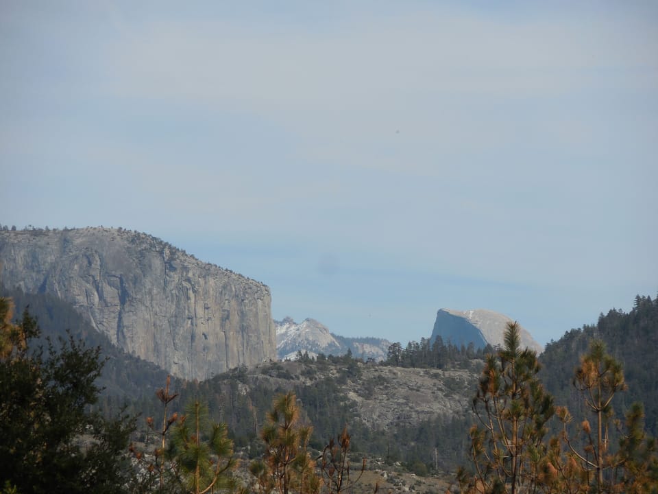 View of Half Dome and El Capitan from deck
