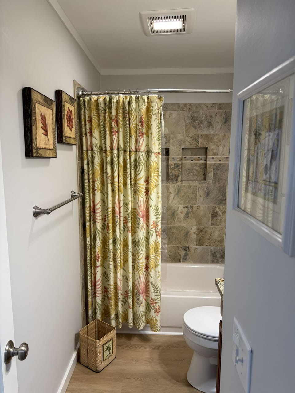 Full second bath with tiled shower and tub