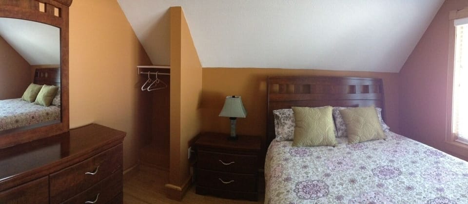 Second level room with queen bed.  Great view of the Lake.