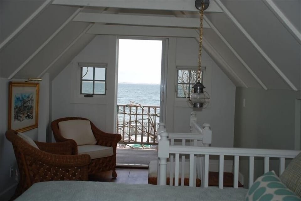 Bedroom sitting area and balcony view