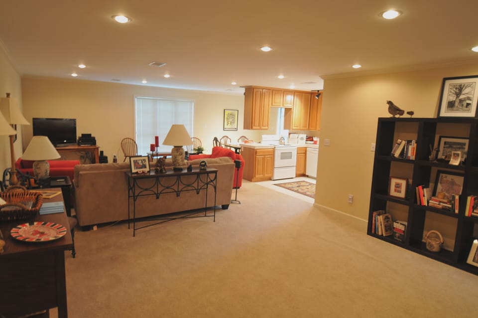 Spacious living room with 42' satellite TV and an inviting seating group.