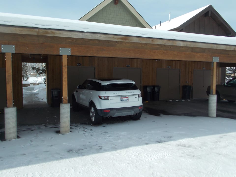 Access to two covered parking stalls.  No ice scraping.
