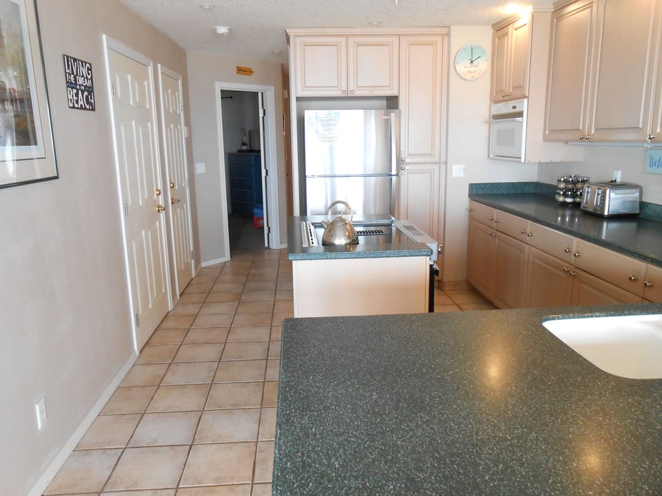 View of the kitchen area from the dining room (your back would be towards ocean)