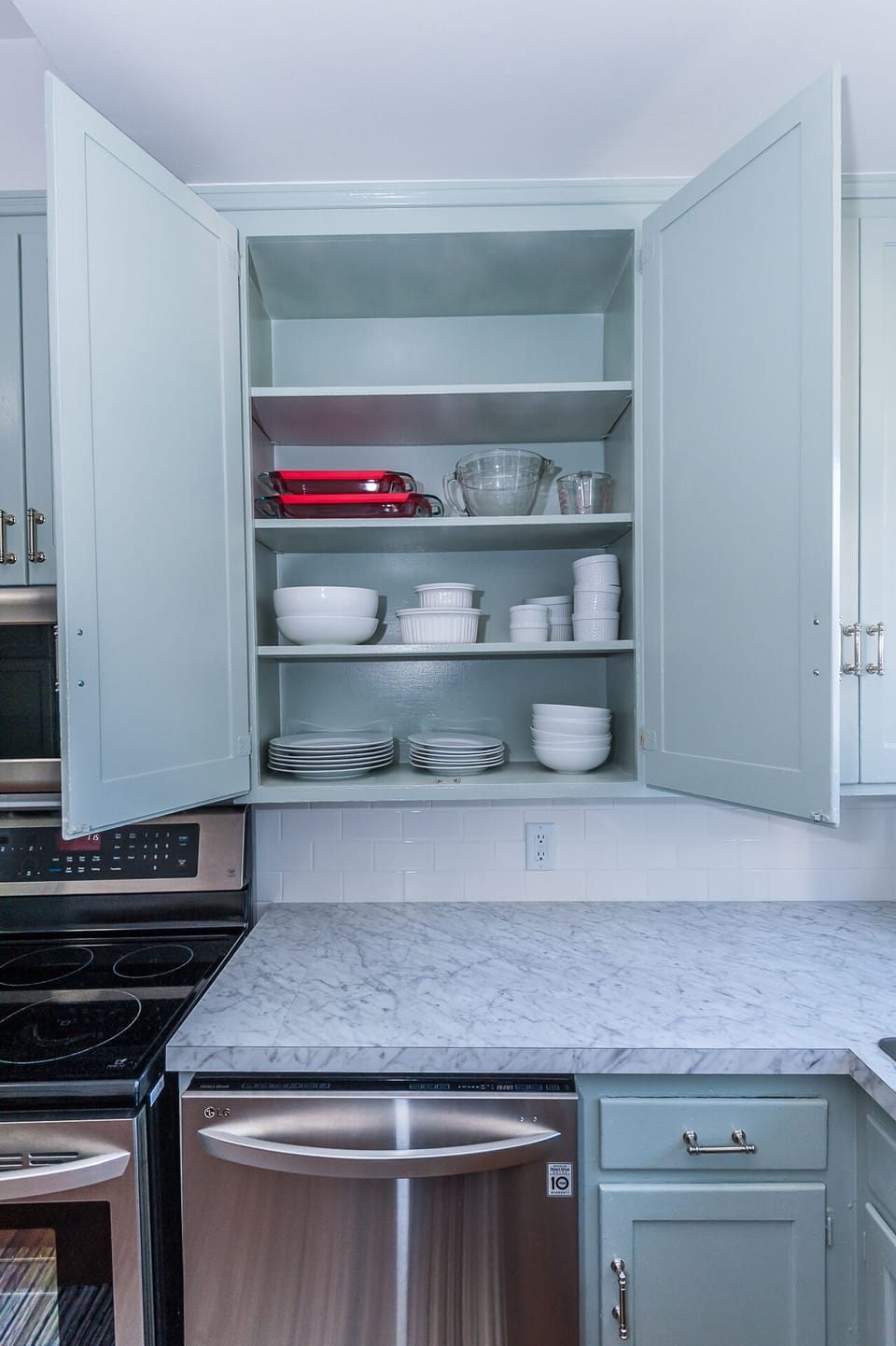 Main floor: Kitchen fully stocked with pots and pans, coffee maker, spices, etc