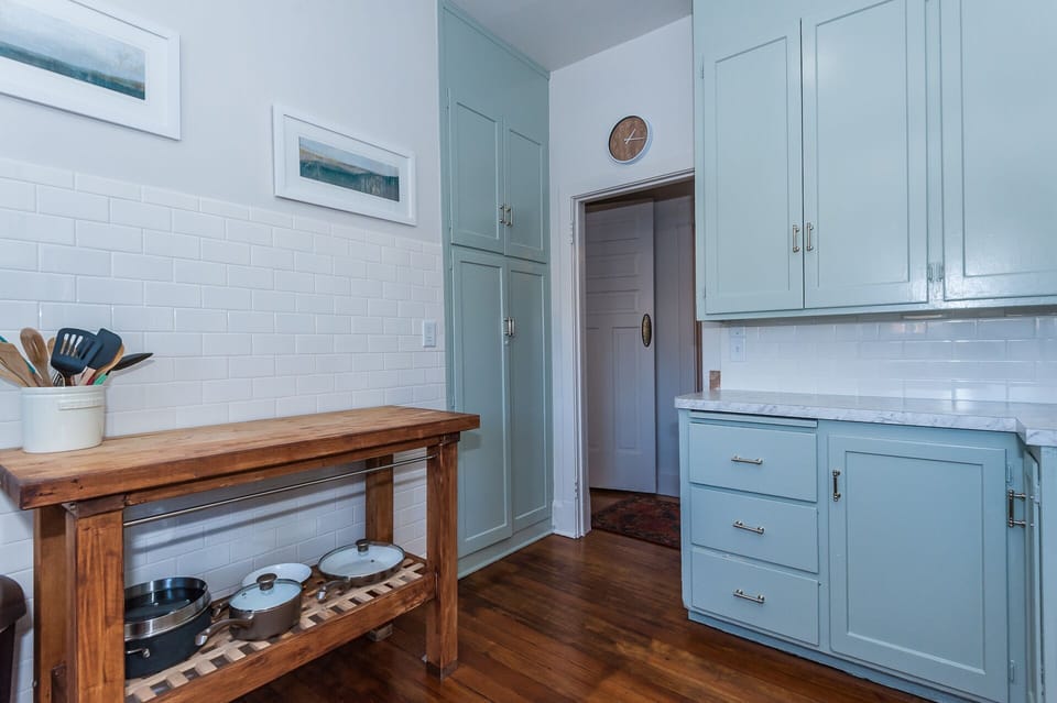 Main floor: Kitchen fully stocked with pots and pans, coffee maker, spices, etc