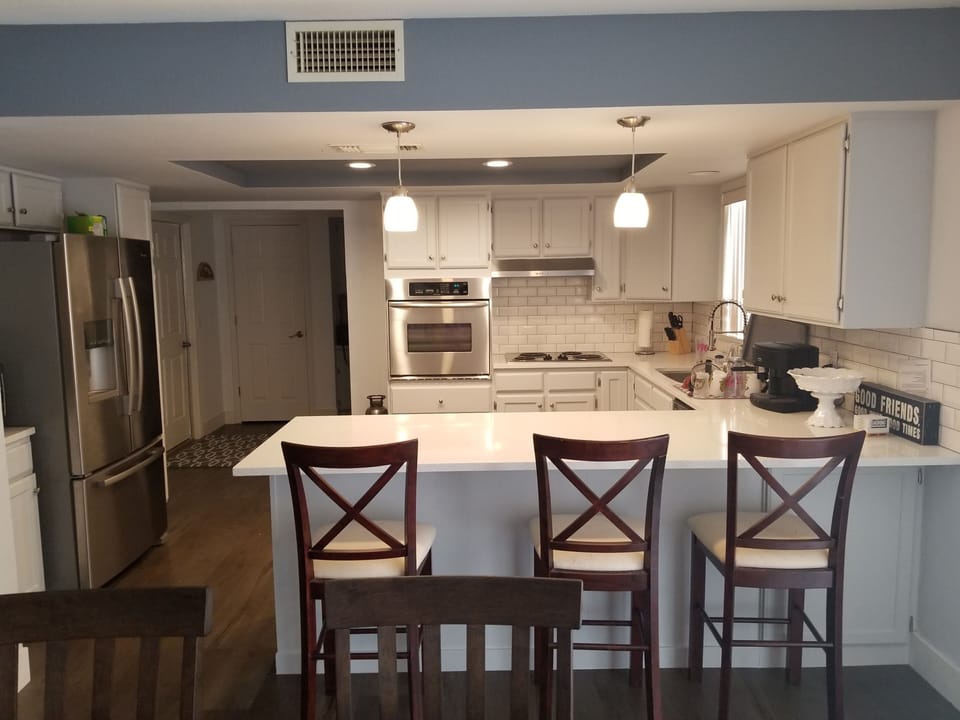 Quartz counters, extra large sink, upgraded and full sized appliances. 