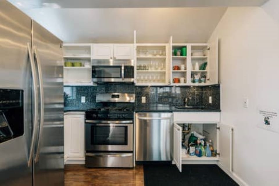 Kitchen - FULLY STOCKED SHELVES AND DRAWS (plates, glasses, silverware, cooking)