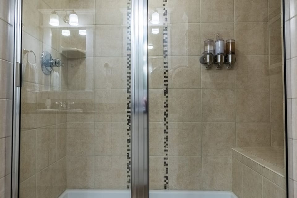 Large walk-in shower in bedroom bath
