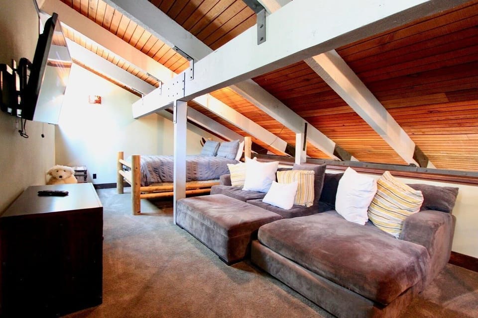 Loft with Queen bed, full bed, giant chaise couches and a 52in TV with Xbox 