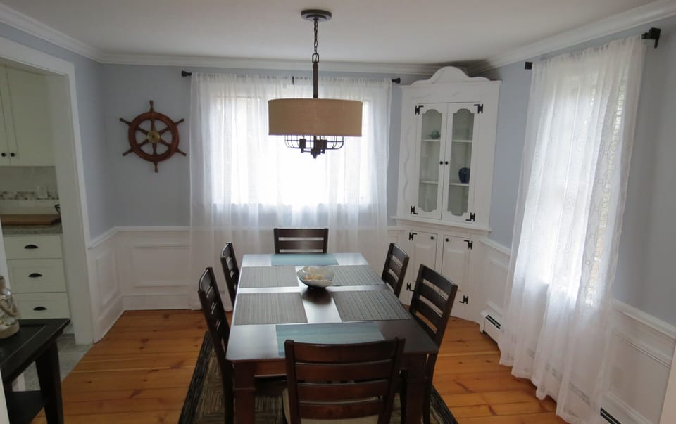 Dining room seating for 8 (additional leaf and chairs not shown)