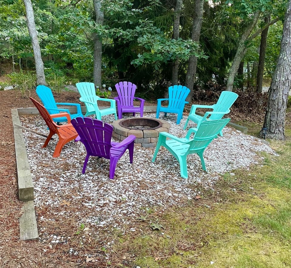 Relax by the fire pit or in the nearby hammock after a day at the beach.