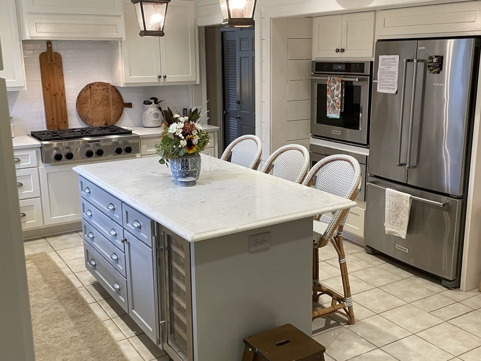 Kitchen island with center island counter with marble top.