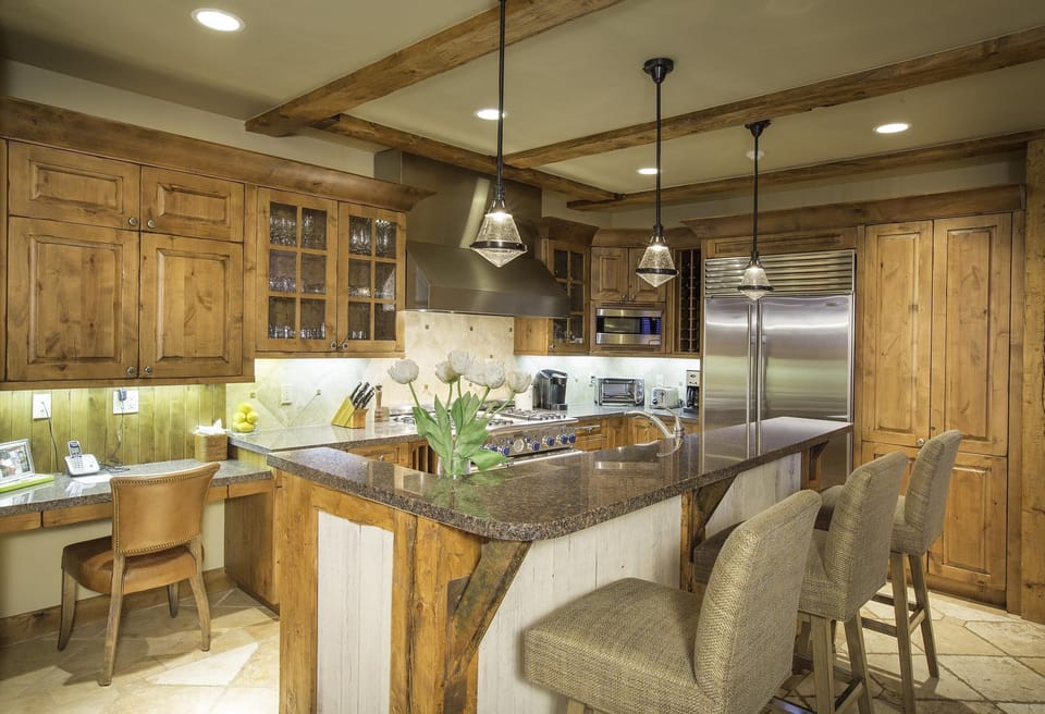 Gourmet kitchen with breakfast bar.