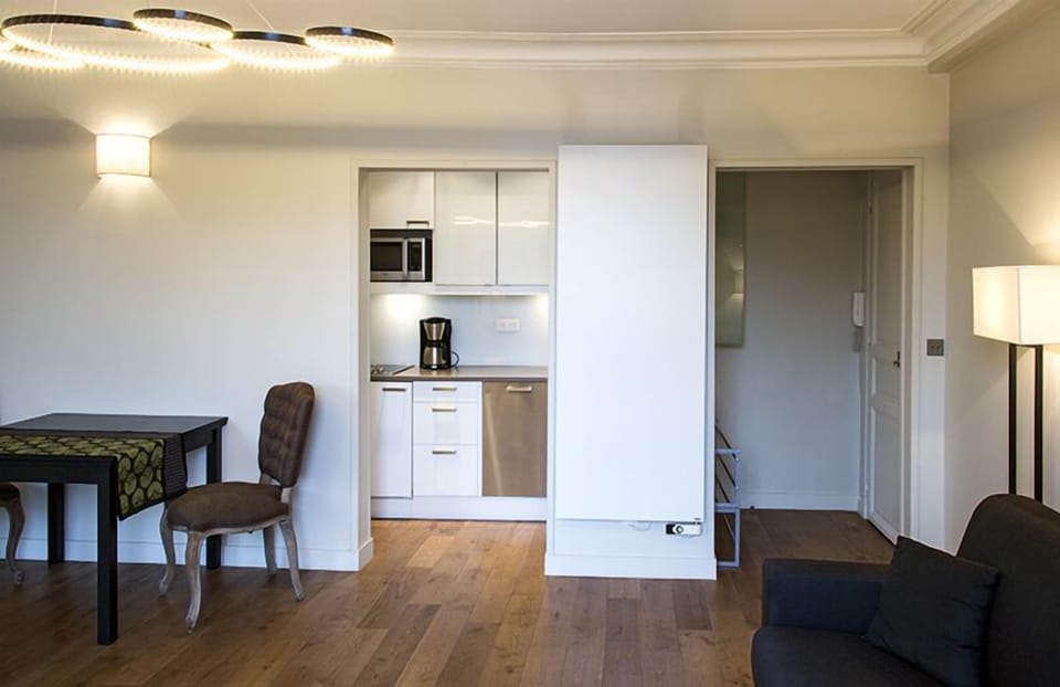 Living room - meal space and kitchen view - entry space.