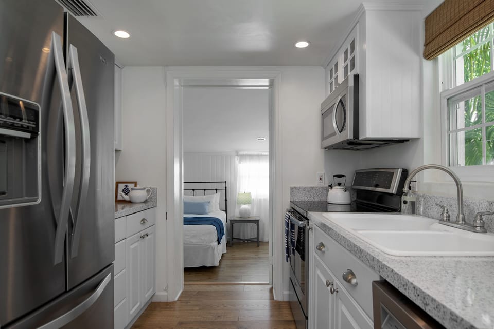 Large fridge/freezer, Ice maker, dishwasher, microwave, stove, oven, pantry. 